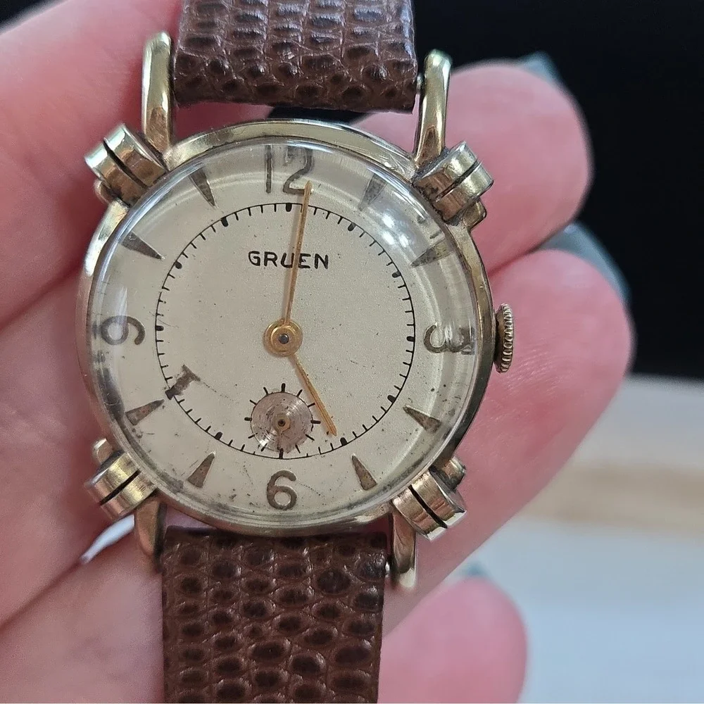 Gruen note gold band